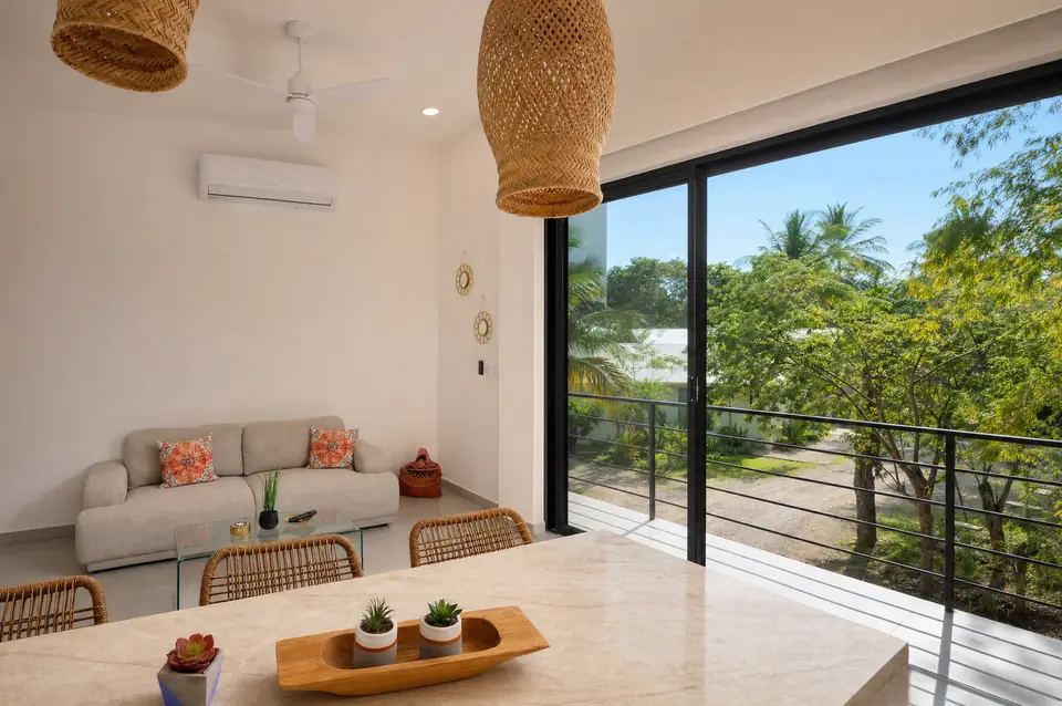 Noma Pura Vida sunlit upper-floor living room